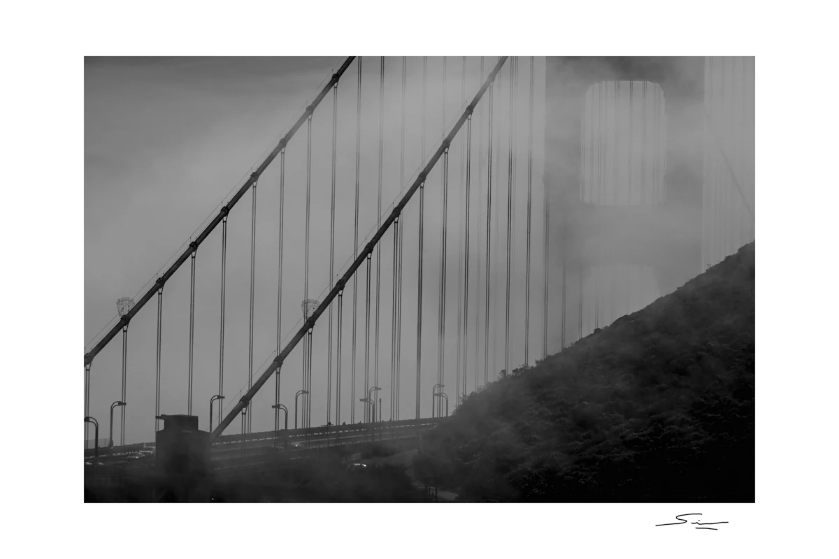 Black-and-white Golden Gate Bridge photograph with its original white border